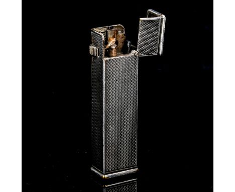 Vintage Dunhill pocket lighter, Cartier licence patent no. 405122, length 6.5cmNot currently working, slightly rubbed on the 