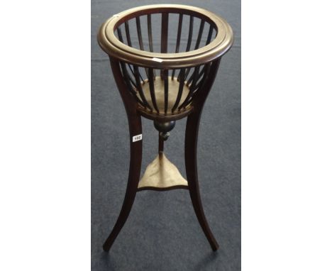 Mahogany basket jardinière, also a Bretby hammered effect planter (damaged) an Indian brass pot