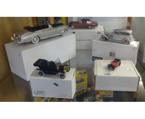 Collection of models comprising Solido Rolls Royce Silver Cloud II 1961, 1910 Ford Model T Coupe, Lledo Austin Seven, 1931 Pe