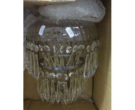 An old glass chandelier light fitting