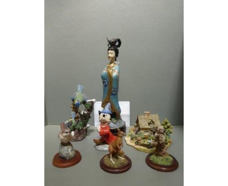 A Royal Worcester Studio figure of a kangaroo, a Worcester koala, a Royal Doulton Mickey Mouse and two Border Fine Arts figur
