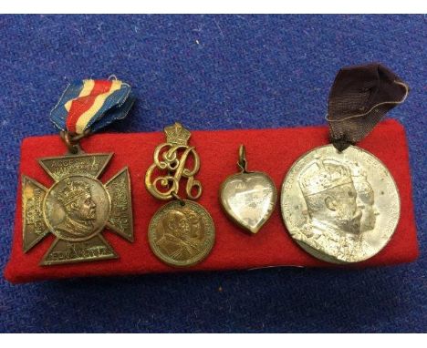 Two King Edward VII Coronation medals, an Edward VII stick pin with pendant and a double sided heart shaped pendant with inse