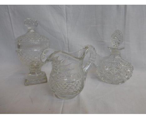 A good quality 19th Century cut glass lidded vase, a well cut glass oval decanter with stopper and a 19th Century cut glass w