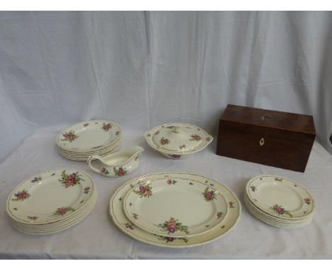 A six setting Bristol dinner service decorated with summer flowers including graduating meat plates, a tureen, a gravy boat e