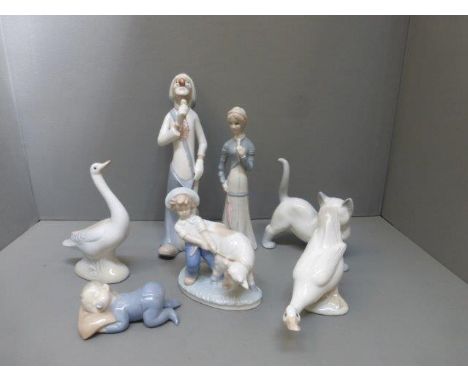 Six assorted Lladro style figurines including animals. 