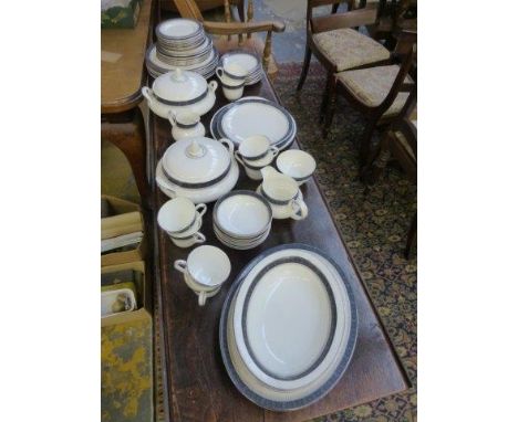 A Royal Doulton Sherbrooke pattern eight setting tea and dinner service including tureens and meat plates. 