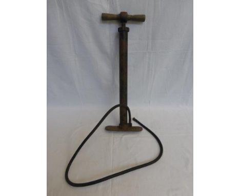 A WWII U.S. Army 'Ordinance' military jeep tyre pump by Circle N from 1942.