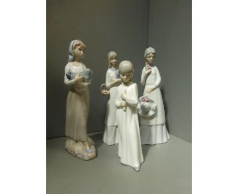 A group of four Lladro style figurines. 