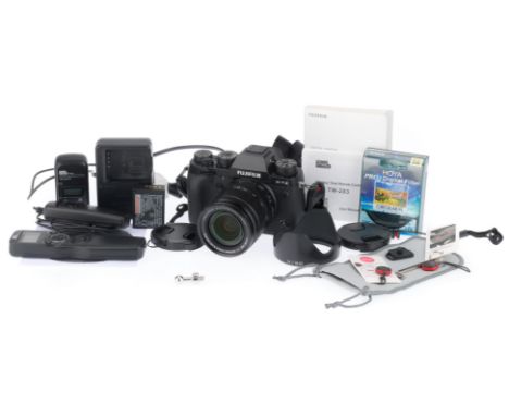 black, body VG, powers up, takes a picture, with charger, two batteries, guide book, software, with a Fujinon Aspherical XF 1
