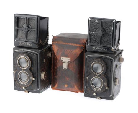 black, both in F cosmetic condition, one with a detached reflex mirror, shutter sticks, the other with the shutter working bu