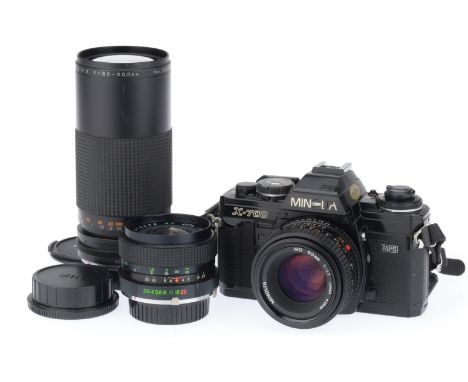 black, body G, LEDs light up in viewfinder, shutter working but sticks open for a few seconds on all speeds, together with a 