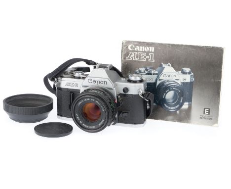 silver, serial number 2928554, body G, shutter works, viewfinder needle responds to light, with a Canon f/1.8 50mm lens, barr