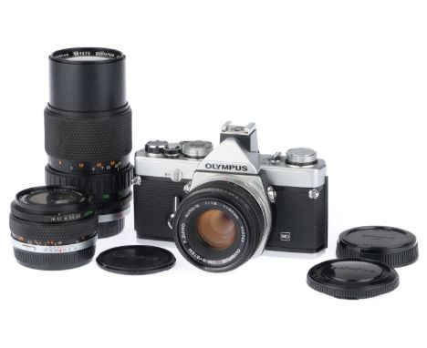 chrome, body G, shutter working, some marks to the bottom edge of the viewfinder when viewing, doesn't obstruct the viewfinde