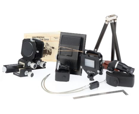to include a Pentax right-angle finder, a Pentax magnifying finder, a Pentax auto bellows and slide copier with operating man