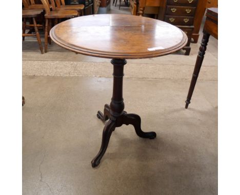 A Victorian mahogany circular tripod lamp table 