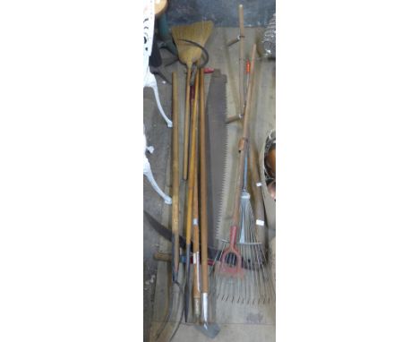 Assorted vintage garden tools including a spear 