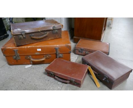 Five vintage leather cases