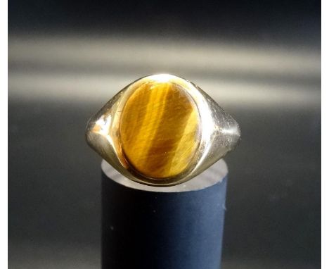 TIGER'S EYE SIGNET RINGon nine carat gold shank, ring size W 