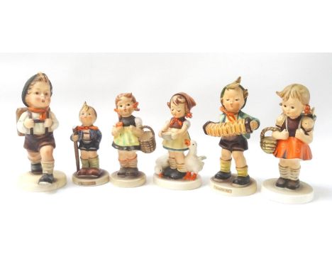 FIVE PORCELAIN GOEBEL FIGURESdepicting young children and a similar German figure marked M.J.H (6) 