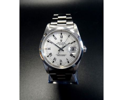 GENTLEMAN'S ROLEX OYSTER PERPETUAL DATE WRISTWATCHthe stainless steel oyster bracelet and case with a white dial with hour ba