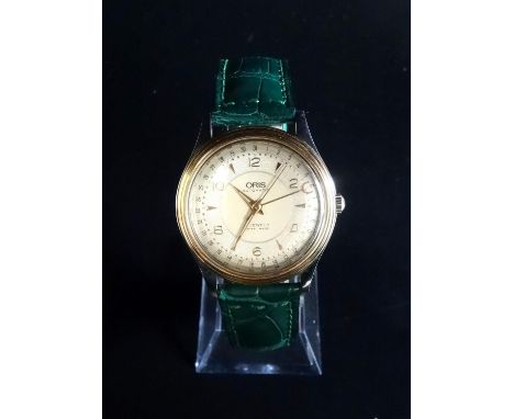 GENTLEMAN'S ORIS POINTER DATE WRISTWATCHthe engine turned dial with Arabic numerals and triangular markers, the outer date ri
