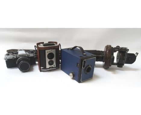 PHOTOGRAPHIC INTERESTincluding an Olympus 35mm OM10, Kodak No2 Brownie with case, Kodak Brownie Reflex and an A.M. Astro Comp