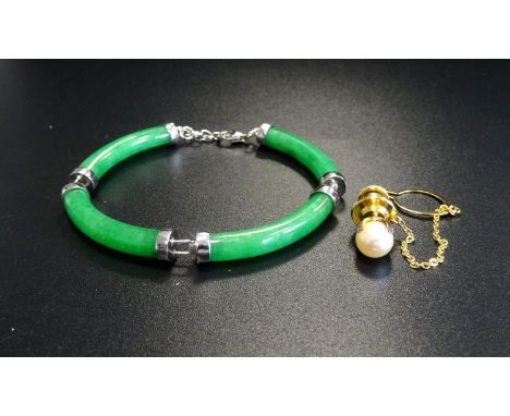 JADE SECTIONAL BRACELETin silver; together with a pearl set tie pin in silver gilt (2) 