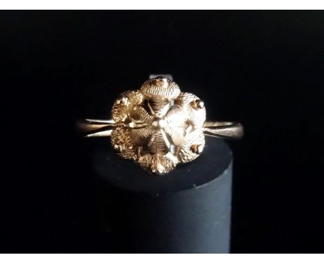 RUSSIAN FOURTEEN CARAT ROSE GOLD RINGwith central stylised crown, ring size Q-R and approximately 2.7 grams 