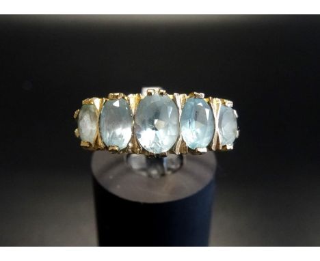 AQUAMARINE FIVE STONE RINGwith five graduated oval cut aquamarines, on nine carat gold shank, ring size P 