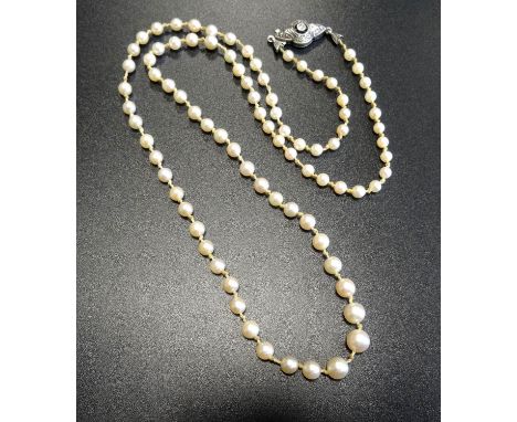 GRADUATED CULTURED PEARL NECKLACEwith individually knotted pearls and diamond set silver clasp 