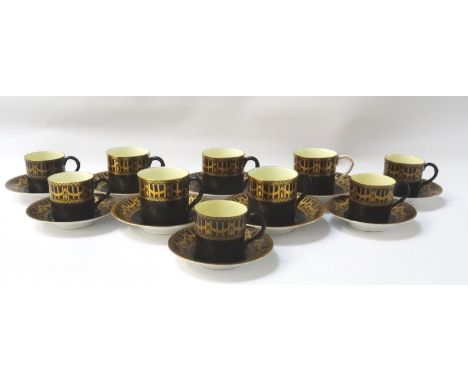 ROYAL WORCESTER COFFEE SETcomprising six cans and saucers together with five smaller cans and saucers, all decorated gilt dec