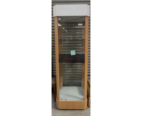 TALL GLAZED DISPLAY CABINETwith light fitments to upper and middle sections, glazed shelving and central tartan covered shelf