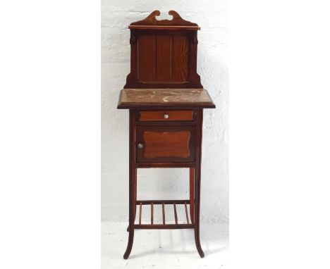 FRENCH PINE WASH STANDwith a shaped raised back with a moulded shelf above a panelled back with a marble top below, and a pan