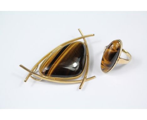 A Lady's Vintage 9ct Gold and Tigers Eye Ring, size K together with a stylistic pendant brooch approx 60 x 40 mm, approx 18.6
