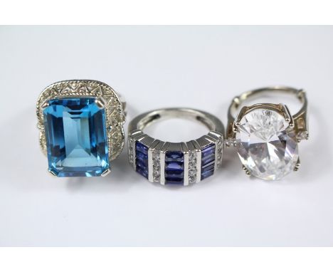 Five Silver Dress Rings, emerald-cut topaz ring approx 18 x 12 mm size K, an oval-cut CZ ring size M, approx 17.2 gms togethe