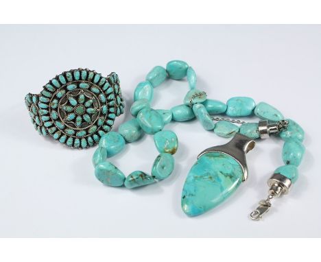 Turquoise and Silver Jewellery, including a polished turquoise necklace approx 45 cms together with a silver and turquoise ar