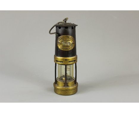 Thomas &amp; Williams Ltd Miner's Lamp; Cambrian Makers, Aberdare, the lamp Nr 1725 Nr 1, approx 24 x 8.5 cms.&nbsp;
