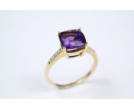 Antique 9ct Yellow Gold, Amethyst and Diamond Ring. The cushion-cut amethyst measuring approx 8.5 x 8.5mm set with approx 6pt
