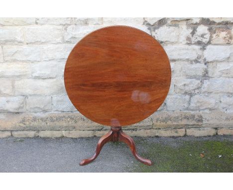 Antique Oak Tilt-top Supper Table, turned column terminating on tripod base, approx 85 x 20 cms.