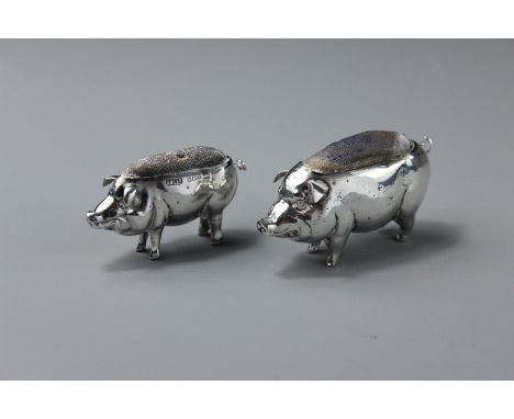 A Silver Novelty Piglet Pin Cushion, Birmingham hallmark, dated 1905, mm BPDC, approx 60 x 40 mm together with a smaller pig 