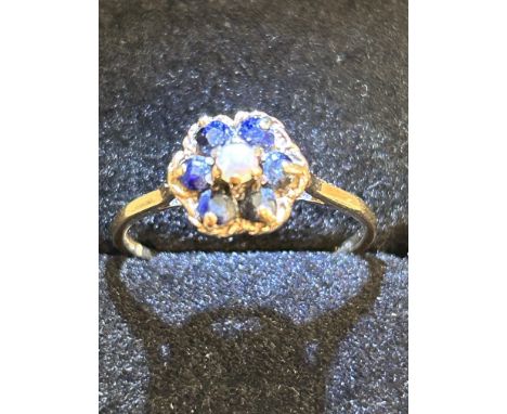 9ct Gold ring set with central pearl surrounded by 6 sapphires Size Q 