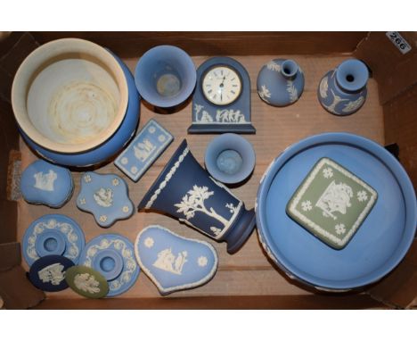 Wedgwood Jasperware in varying colours to include blue, green and cobalt blue to include a pedestal bowl, a mantle clock, an 