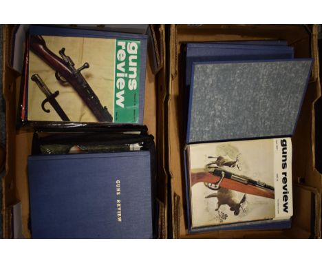 Guns and Review bound magazine editions from the 1960s and 1970s. Large quantity in two trays.  In good clean vintage conditi