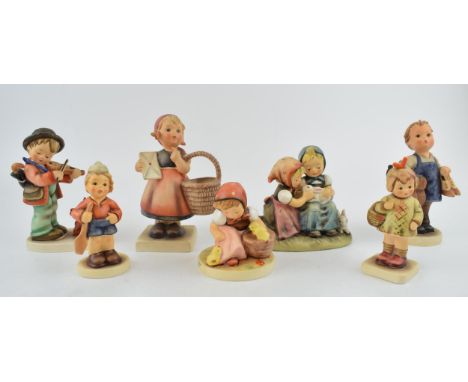 A good collection of Goebel / Hummel child figures to include Boots, Puppy Love, First Mate, Children with White Rabbits, Chi