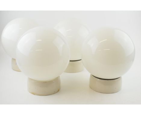 Four Art Deco globe ceiling lights 'Made in England' with glass globes and off white ceramic ceiling mounts with bayonet fitt