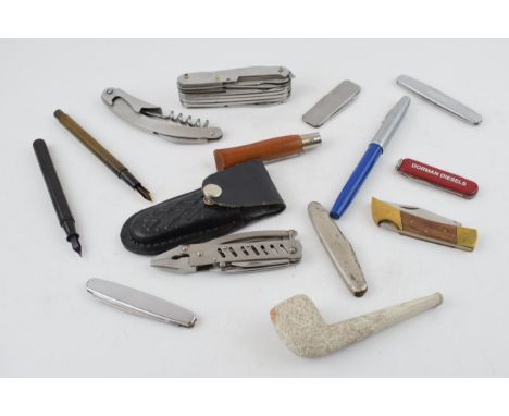 A collection of vintage penknives to include examples by Victorinox, together with a collection of vintage fountain pens incl