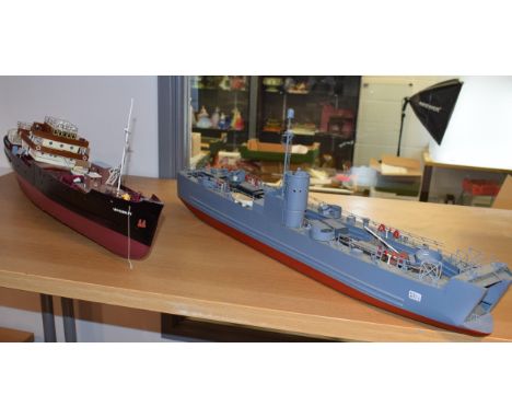 Two Model Boats, Kit built models of the 'LSM 7 Naval Destroyer' Dertailed equiptment and vehicles. Length 84cm, Height 28cm.