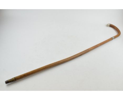 An early 20th century walking cane with silver collar, Birmingham 1918, J Howell &amp; Co, inscription to collar 'HO to HEO 1