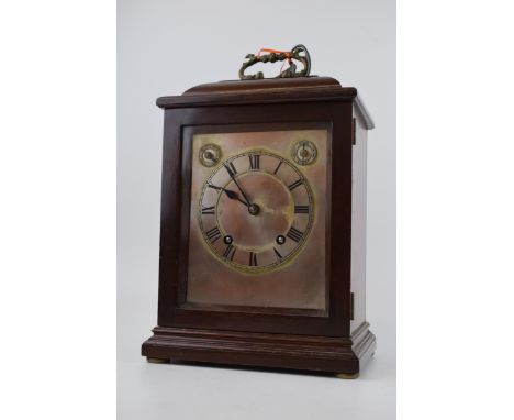 Mahogany case mantle clock with pendulum chiming movement marked W&amp;H SCH. With pendulum and key. Case height 35cm.  Winds