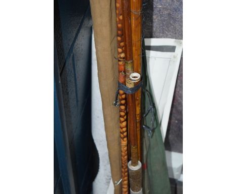 A collection of vintage cane fishing rods including examples by James Aspindale &amp; Sons, "Dalesman", Edgar Sealey and Sons